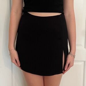 reformation black mini skirt with slit